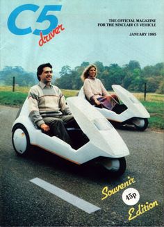 two people sitting on top of an electric vehicle