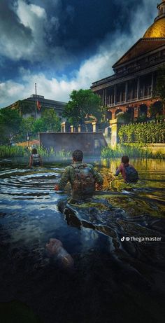 two people in the water near a building