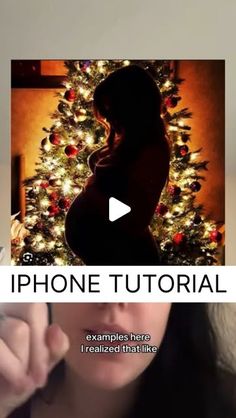 a woman holding her hand up in front of a christmas tree with the words iphone tutor