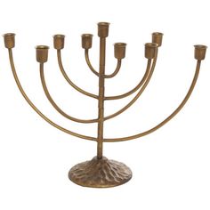 a golden menorah with five candles on it