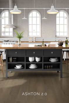 an image of a kitchen setting with wood flooring