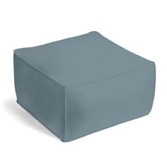 an image of a square ottoman cover in light blue color on the white background for use as a seat cushion