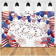 an american flag background with balloons and streamers on the floor in front of a brick wall