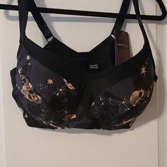 Nwt Mid Impact Underwire Sports Bra Size 42dd. Go From The Gym To Running Errands In This Stylish Black Bra With Skulls. Constructed To Comfortably Give You Support During Your Low-To-Medium Impact Workouts. These Bras Are Comfortable To Work Out In/. I Am Only Selling As I Need A Bigger Size. I Have Others And I Love Them. Sports Bra Silhouette. Underwire Cups. Lightly Lined. Low-To-Medium Impact. U-Back For Comfortable Support. Adjustable Straps. J-Hooks To Convert To Racerback. Wide Side Band Underwire Sports Bras, Black Bra, Sports Bra Sizing, Black And Tan, Women's Intimates, Adjustable Straps, Sports Bra, Bra, Women Shopping