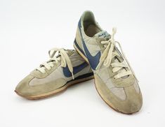 Vintage sneakers - Nike  Mod. Oceania  Serial number: 830406th5 Made in Rep de Korée 1980s Canvas and leather (nylon/suede) sneakers in gray and blue. Sold without original box Original model. They are not recommended for sports use. In good condition. Some signs of wear. To note:(photos) Sole slightly stiff but not brittle. Toe of sole little damaged. Small stains. Size:  USA: 11 EUR: 44,5 Measurements: Insole: 29cm - 11,41" Outsole: 30cm - 11,8" Please note that our items are vintage and may h Nike Vintage Sneakers, Vintage Running, Basket Vintage, Vintage Sneakers, Nike Vintage, Blue And Grey, Suede Sneakers, Running Sneakers, Vintage Nike