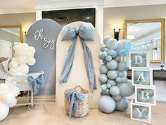 a baby shower with balloons and decorations