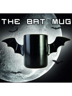 the bat mug is in front of a full moon with bats flying around it and text that reads, the bat mug