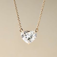 Add some dazzling romance to your style with this lovely 1.00 or 2.00 carat heart-shape lab-grown diamond necklace from Peace Jewelers. You'll love the gorgeous sparkle on your neckline! The piece is finely crafted in your choice of rich 14K yellow or white gold with a polished finish. The 18" cable link chain secures with a lobster clasp. Pair it with matching earrings 215-188 to create a stunning coordinated style. Heart Diamond Necklace, Heart Necklace Diamond, Yellow Heart, Necklace Size, Necklace Sizes, Diamond Heart, 1 Carat, Heart Shape, Link Chain