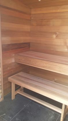 a wooden sauna with benches in it