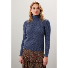 Blue knit (65% wool, 35% nylon). Sweater. Long sleeves. Turtleneck. Pull on. 23" from shoulder to hemline. Imported. Blue Cashmere Outerwear With Ribbed Cuffs, Fitted Soft Knit Turtleneck For Fall, Fitted Sweater For Winter Layering, Long Sleeve Blue Cashmere Sweater, Blue Fine Knit Merino Wool Sweater, Blue Long Sleeve Cashmere Sweater, Blue Merino Wool Fine Knit Sweater, Blue Turtleneck For Winter Layering, Blue Long Sleeve Turtleneck For Fall