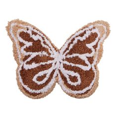 a brown and white butterfly shaped doormat on a white background with the words,