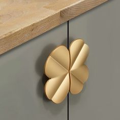 a close up of a cabinet with a flower on it