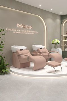 the interior of a salon with pink chairs and plants on display in front of it