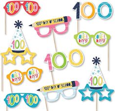 party photo booth props including glasses, sunglasses and stars on sticks with the words 100 days of school printed on them