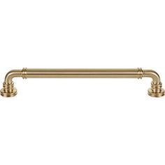 an antique brass pull handle on a white background