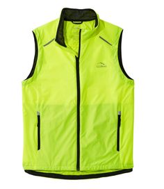 This fitness vest is the perfect layering piece for all your vigorous aerobic pursuits, including running, cycling, hiking or cross-country skiing. High-visibility fabric and reflective accents help keep you safe in low-light conditions. Slightly Fitted. 50-denier polyester with a durable water repellent. Machine wash and dry. Resists wind and moisture. 10 points of reflectivity on chest, back and shoulders for visibility in low light. Back vent promotes airflow to help you stay cool and dry. Me Windproof Nylon Activewear For Running, Sporty Moisture-wicking Running Vest, Sporty Windproof Vest For Sports, Functional Windproof Hiking Vest, Sports Nylon Vest, Nylon Sports Vest, Sporty Windproof Outdoor Vest, Nylon Sportswear Vest For Sports, Sporty Windproof Vest For Outdoor