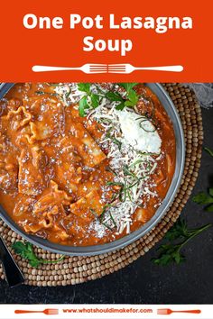 one pot lasagna soup in a bowl with parmesan cheese on top