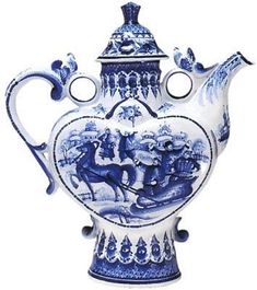 a blue and white porcelain vase with figures on it