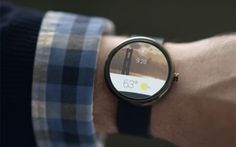 a person wearing a smart watch on their wrist