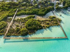 an aerial view of the water and land