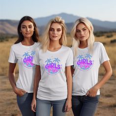 three beautiful women standing next to each other wearing t - shirts with the words girls on it