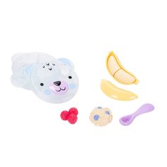 a play food set with bananas, raspberries and a bear face