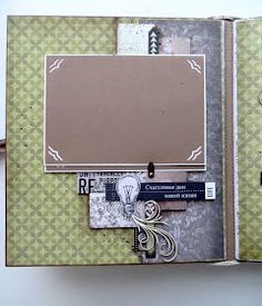 an open scrapbook with papers attached to it