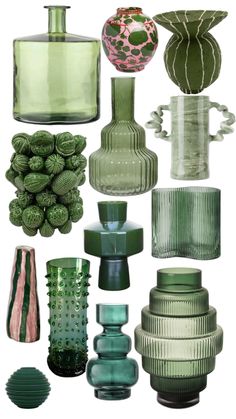 many different colored vases are arranged in a row on a white background, including green and pink