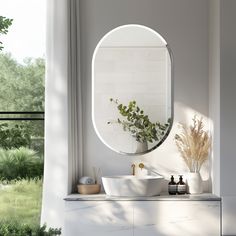 a white sink sitting under a round mirror