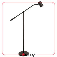 a black floor lamp with a red star on it