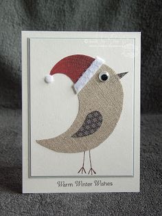 a card with a bird wearing a santa hat