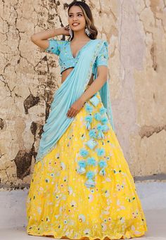 Readymade Faux Georgette Lehenga in YellowThis attire with Cotton and Shantoon Lining is Enhanced with Enhanced with Fancy Tassels, Resham and Sequins Work in Bird MotifsAvailable with a Faux Georgette Sky Blue Choli Crafted in Plunge Neck and Short Sleeves and a Faux Georgette Dupatta in Sky BlueThe Choli and Lehenga Lengths are 15 and 42 inches respectivelyDo Note: Accessories shown in the image are for presentation purposes only. (Slight variation in actual color vs. image is possible). We se Sky Blue And Yellow Outfit, Yellow Floral Embroidered Sharara For Reception, Yellow Embellished Georgette Traditional Wear, Yellow Embellished Anarkali Set With Traditional Drape, Embellished Yellow Georgette Traditional Wear, Yellow Embroidered Pre-draped Saree For Reception, Yellow Embellished Sets For Festivals, Yellow Embroidered Fitted Pre-draped Saree, Fitted Yellow Embroidered Pre-draped Saree