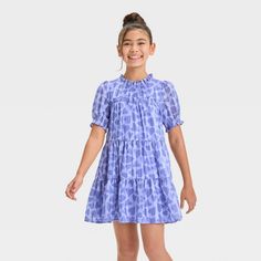 Update your kid's casualwear with this Short-Sleeve 'Heart' Woven Dress from Cat & Jack™. This dress is crafted from lightweight satin fabric with lining to lend comfortable all-day wear, and the behind-the-neck button closure makes dressing easy. Designed with a functional side pocket, this heart-printed dress features a ruff collar, smocked elbow sleeves and a tiered hem for sweet style. They can add sandals, slip-ons or sneakers to complete the look. Cat & Jack™: Designed for all children so Ruff Collar, Velour Dress, Bishop Sleeve, Periwinkle Blue, Kids Outfits Girls, Elbow Sleeve, Polyester Satin, Sweet Style, Woven Dress