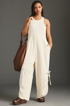 For weekends and workouts, lounging and living, Daily Practice by Anthropologie ensures that ease is always on the agenda. Ideal for navigating busy days or discovering new cities, this one-and-done wonder features side pockets, a ruched tie detail, and an exceptionally soft feel. | Horizon Wide-Leg Jumpsuit by Daily Practice by Anthropologie in White, Women's, Size: 2XS, Cotton/Elastane Comfy Jumpsuits, Sleeveless Short Dress, Cozy Knits, Knit Set, Wide Leg Jumpsuit, Jeans Dress, Easy Wear, Set Dress, Effortless Style