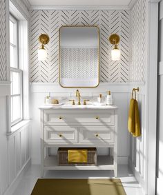 a white and gold bathroom with two sinks