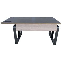 a wooden table with black metal legs and a white surface on the top, in front of a white background