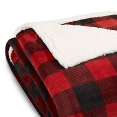 a red and black checkered blanket with a white sherpam on the top