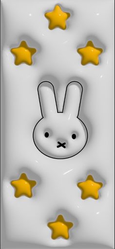 a white rabbit with yellow stars in the background