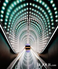 an image of a tunnel with lights going through it