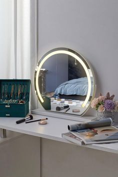 a mirror sitting on top of a white table