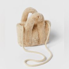 Nwt Zara Kids Faux Fur Crossbody Bag. - Faux Fur Crossbody Bag. - Two Straps And A Shoulder Strap. - Clip Closure. Height X Length X Width 5.5 X 7.9 X 2.4 Inches (14 X 20 X 6 Cm) Kids Bunny Slippers, Backpacks For Girls, Kids Teddy Bear, Bunny Slippers, Zara Australia, Business Chic, Zara Kids, Basket Bag, Girl Backpacks