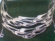 "A rare vintage Scottish sterling silver \"flight of swallows\" collar necklace inspired by Peter Wylie Davidson. This is a fantastic piece of collectable jewellery that is very sort after and will only increase in value. perfect condition with original box. Fully hallmarked for Edinburgh, CA, 1977. The necklace is very wide measureing 5.1cm across the widest point and sits beautifully on the collar bones. the chains either size of the swallows are a total of 24cm + 14cm measureing across the top of the swallows. Please ask if you wish to see pics of the measurements!" Fine Chain Necklace, Spoon Necklace, Vintage Jewellery Rings, Diamond Tiara, Soldering Jewelry, Collar Jewelry, Jewelry Business, Jewelry Inspo, Vintage Jewellery