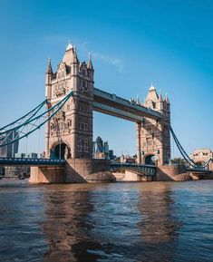 the tower bridge is very high on the water