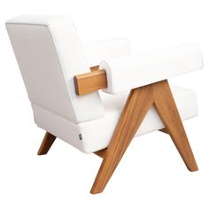 an upholstered white chair with wooden legs and arm rests on a white background