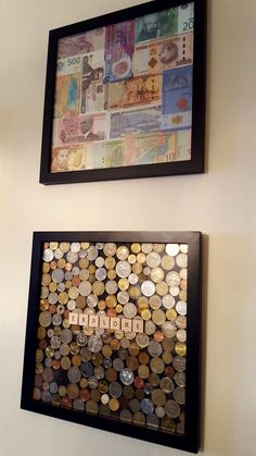 two framed pictures on the wall with different types of coins in them and one has a word written on it