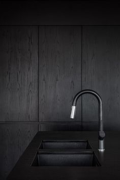 the instagram page shows an image of a black kitchen sink and faucet