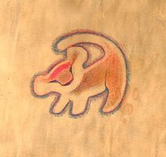 a drawing of a lion on the side of a piece of paper that is drawn with colored pencils