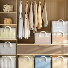 an organized closet with clothes and bags hanging on the wall, along with other storage bins