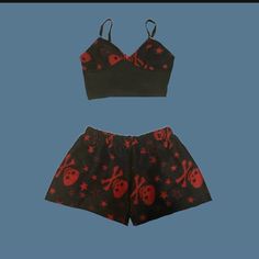 red and black fleece skull shorts and cami pajama set! handmade by me and made to order :) please message me if you need custom measurements! Skull Pants Pajamas, Cheap Black Pajama Shorts For Summer, Goth Pajamas Comfy, Cheap Black Character Print Sleepwear, Cheap Pajama Shorts For Sleepovers, Goth Matching Pajamas, Cheap Black Summer Pajama Shorts, Cheap Fitted Halloween Sets, Cheap Black Sleepwear With Character Print