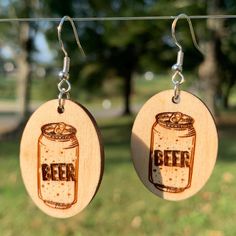 Can of Beer Earrings Laser Engraved and Assembled by us in the foothills of North Carolina. Double Sided (Image on Both Sides of each Earring.) Made with 925 Sterling Silver Hypo Allergenic Ear Hooks and Birch Wood. 1.25 " (inches) Tall 1/8" Thick Thanks for viewing :) Wooden Earrings, Beer Can, Beer, Jewelry Earrings Dangle, Dangle Drop Earrings, Dangle Earrings, 925 Sterling Silver, Jewelry Earrings, Gift Card